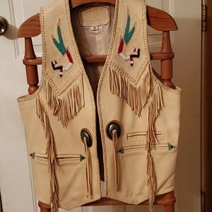 Handmade buckskin leather vest.